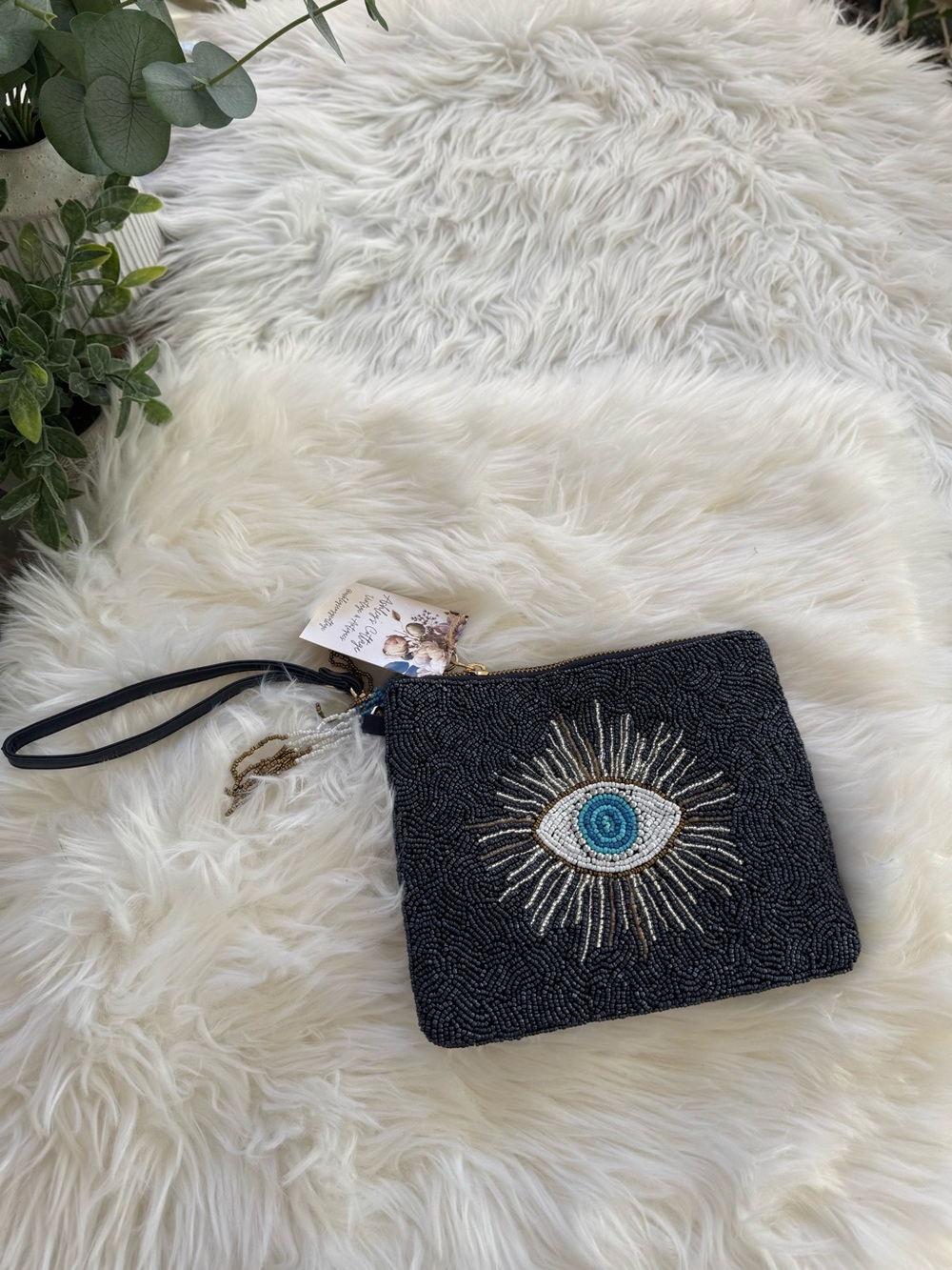 Sincerly Jules Black Beaded Wristlet with Blue Eye Embellishment